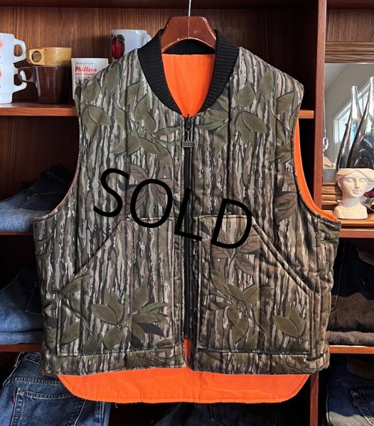 画像1: 【90’s〜】【ビンテージ】【Walls】ウォールズ【リアルツリーカモｘオレンジ】中綿入り【ダウンベスト】【サイズＬ程度】  (1)