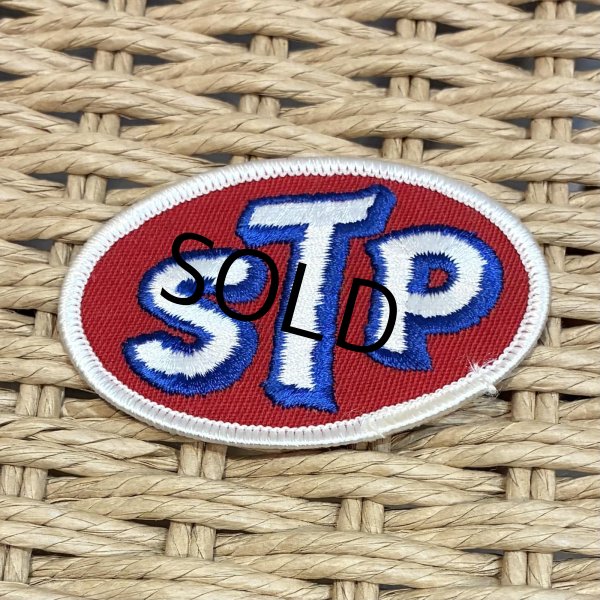 画像1: デッドストック【ビンテージ】【STP】ワッペン 7.5x5ｃｍ   (1)